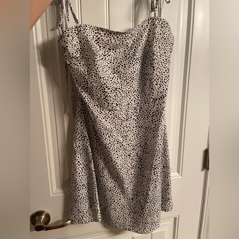 White sundress with black polka dots